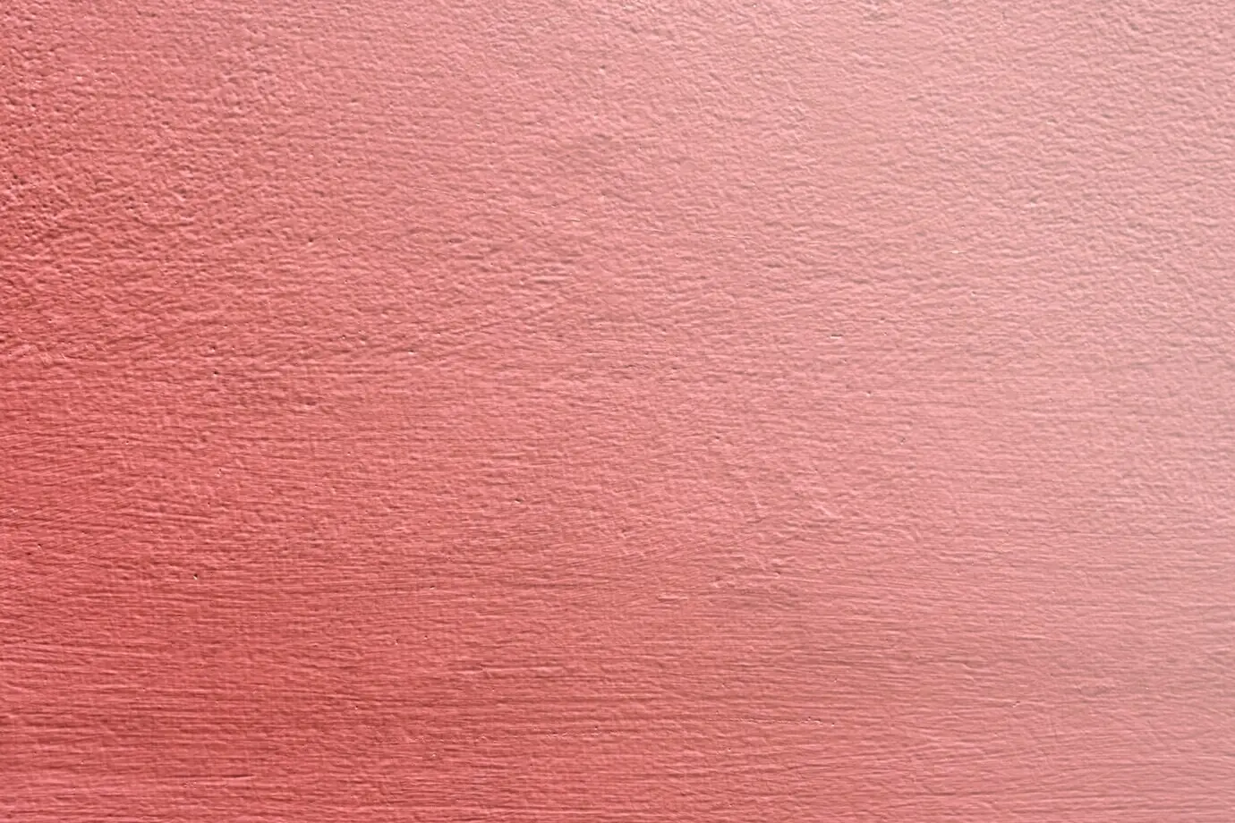 Hintergrund einer einfarbigen pinken Wand